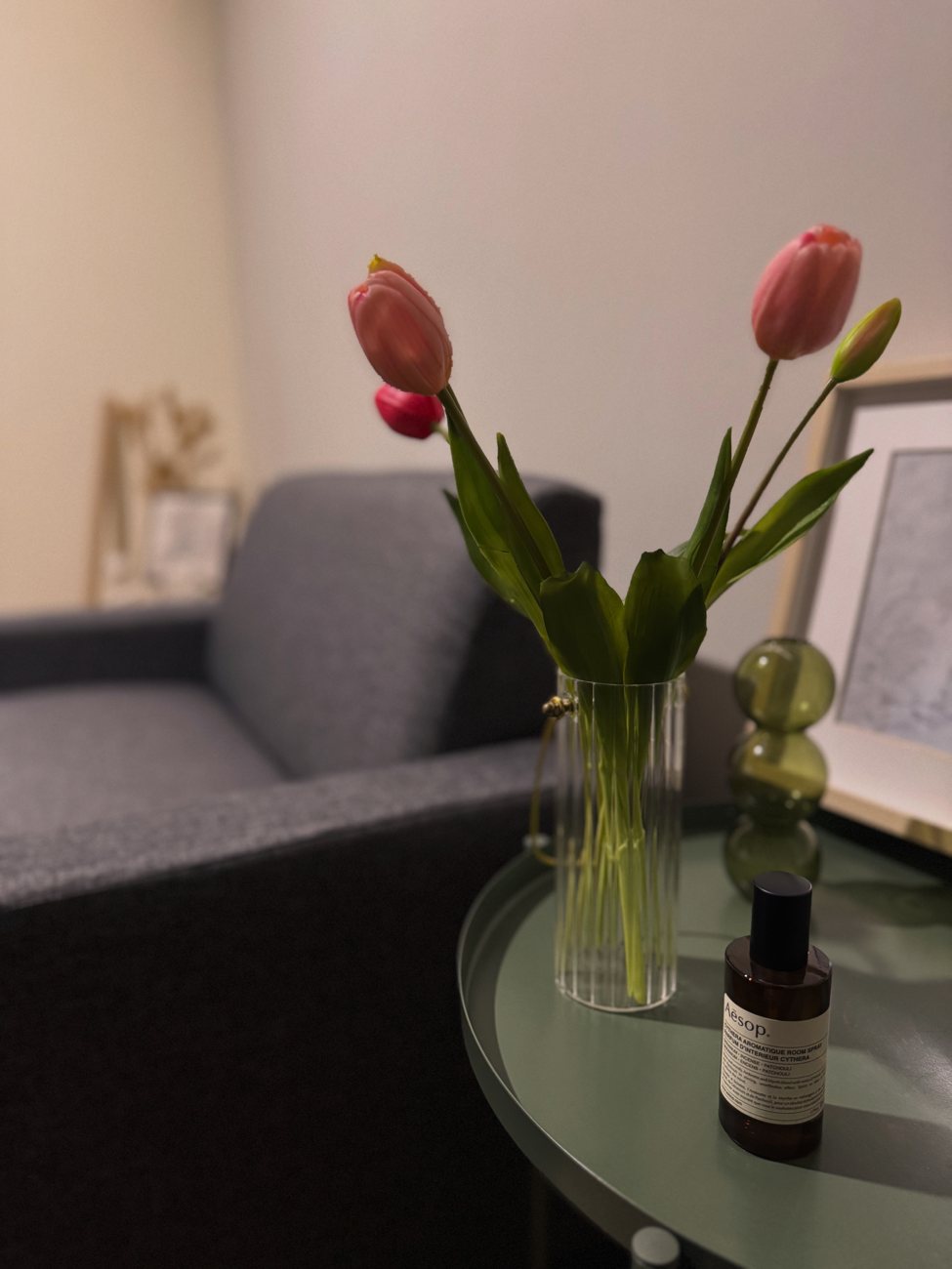 Tulips on a table with a soft counselling room background